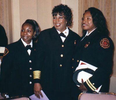 East Point Fire Chief Rosemary Cloud (center) and two firefighters from Jackson, Mississippi who attended the June 7 event in her honor